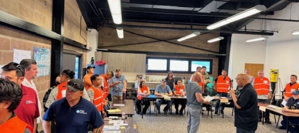 Photo of community meeting.